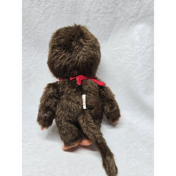 SEKIGUCHI 7.5" MONCHHICHI BOY WEARING RED BIB HOLDING PACIFIER DOLL - Picture 8 of 10